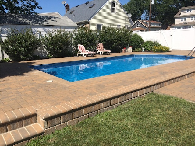 724 Thrush Ave, West Hempstead, NY 11552 - view of pool with a patio area and a fenced backyard