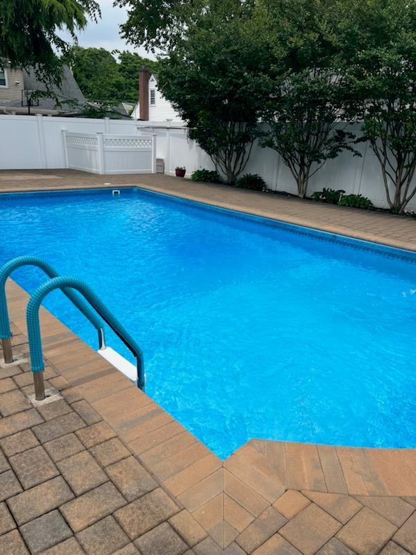 724 Thrush Ave, West Hempstead, NY 11552 - view of pool featuring a fenced backyard