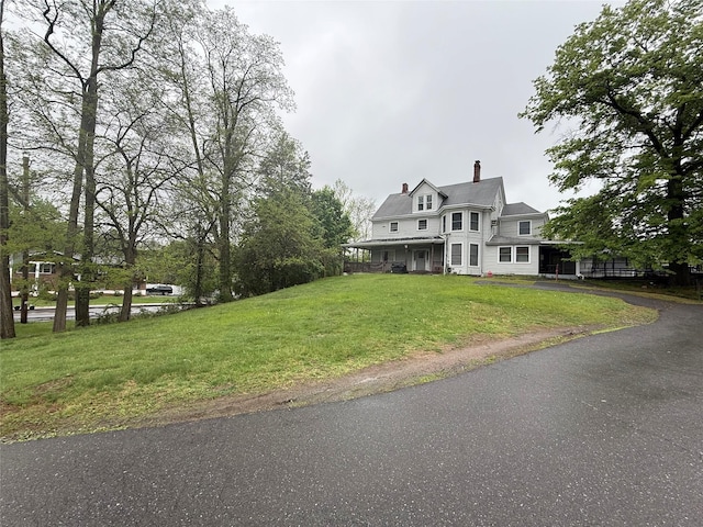 64 Rosman Rd, Thiells, NY 10984 - victorian home with driveway, a front yard, and a chimney