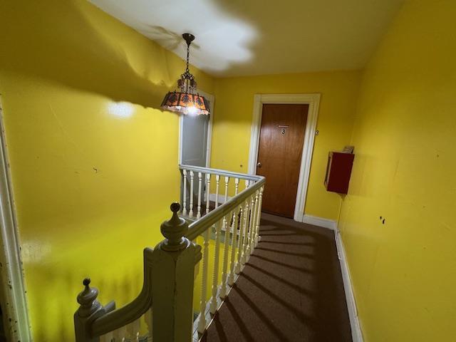 64 Rosman Rd, Thiells, NY 10984 - stairway featuring baseboards