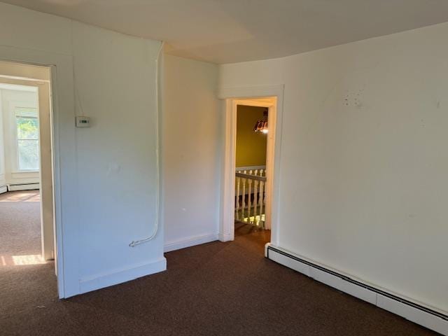 64 Rosman Rd, Thiells, NY 10984 - carpeted spare room with baseboards and a baseboard radiator