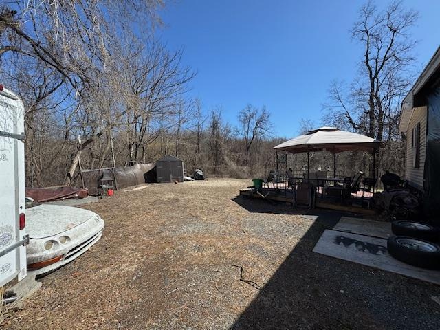 64 Rosman Rd, Thiells, NY 10984 - view of yard featuring a storage shed, an outdoor structure, and a gazebo