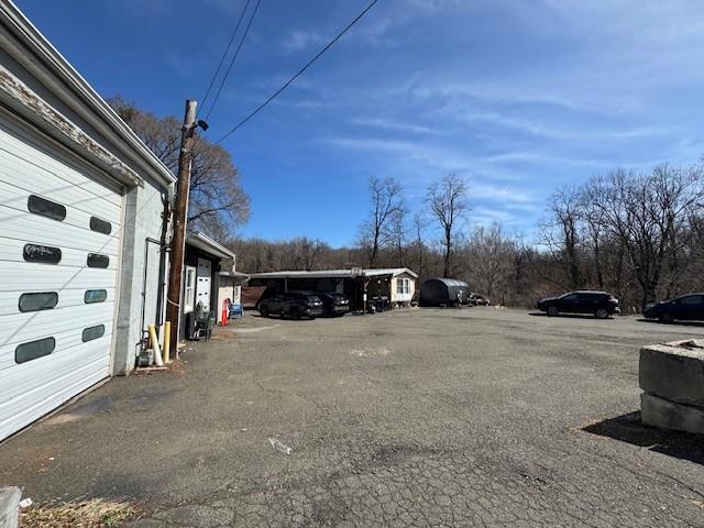 64 Rosman Rd, Thiells, NY 10984 - view of uncovered parking lot