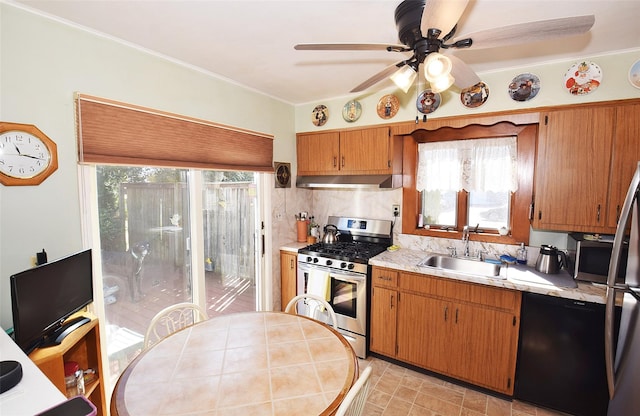 kitchen featuring a sink, gas stove, ventilation hood, light countertops, and dishwasher