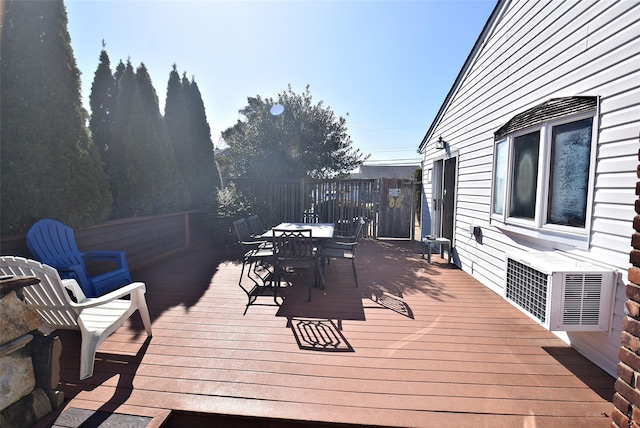 deck with outdoor dining space