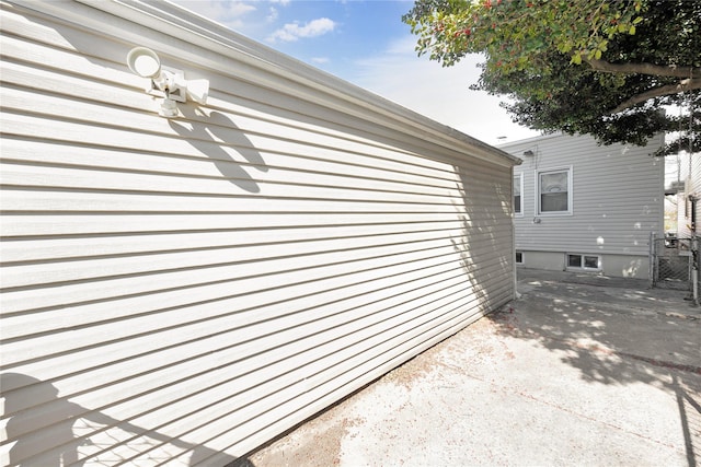 view of property exterior with a patio