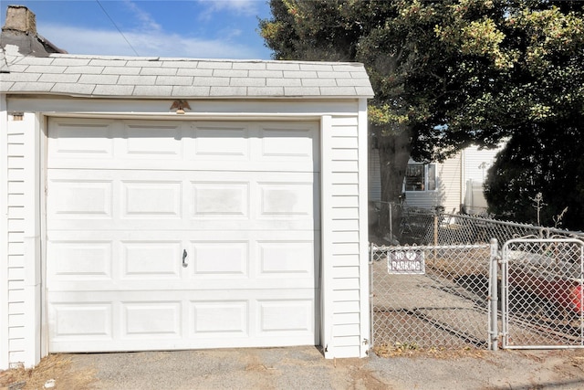 garage with fence