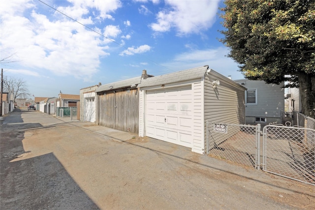 garage featuring fence