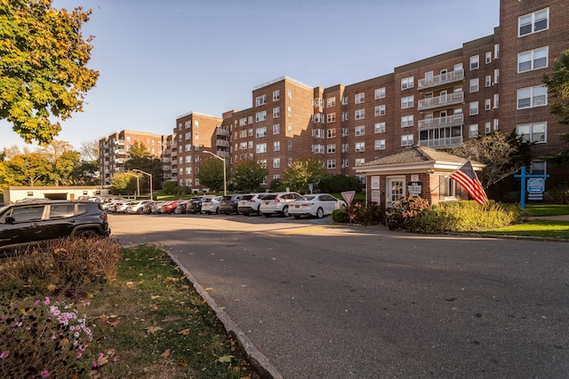 view of property with uncovered parking