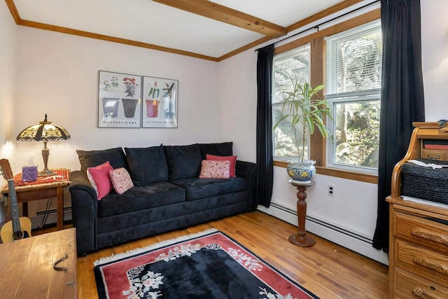 living area featuring beam ceiling, wood finished floors, crown molding, and a baseboard radiator