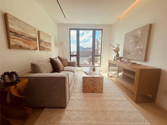 108-15 72nd Ave Unit 5A, Forest Hills, NY 11375 - living area with light wood-style floors and baseboards
