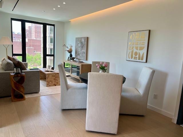 108-15 72nd Ave Unit 5A, Forest Hills, NY 11375 - dining room featuring light wood-style flooring, recessed lighting, and baseboards