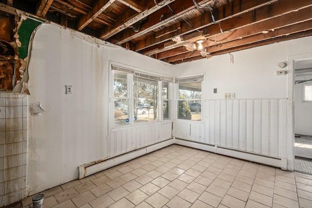 interior space featuring tile patterned floors and a baseboard radiator