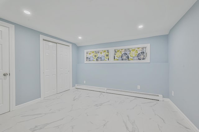 unfurnished bedroom featuring recessed lighting, baseboards, marble finish floor, and a baseboard radiator