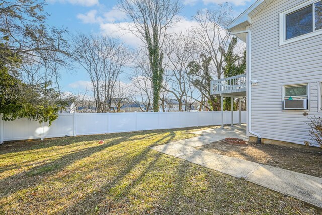 view of yard with a patio area and a fenced backyard