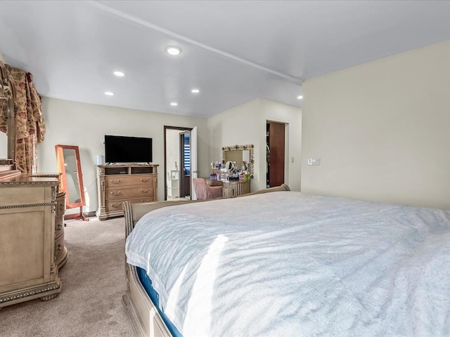 bedroom with light carpet and recessed lighting