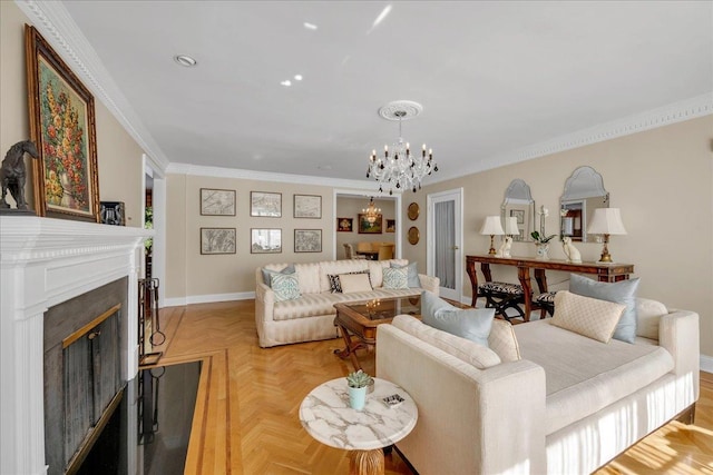 living area with a fireplace, a notable chandelier, baseboards, and crown molding