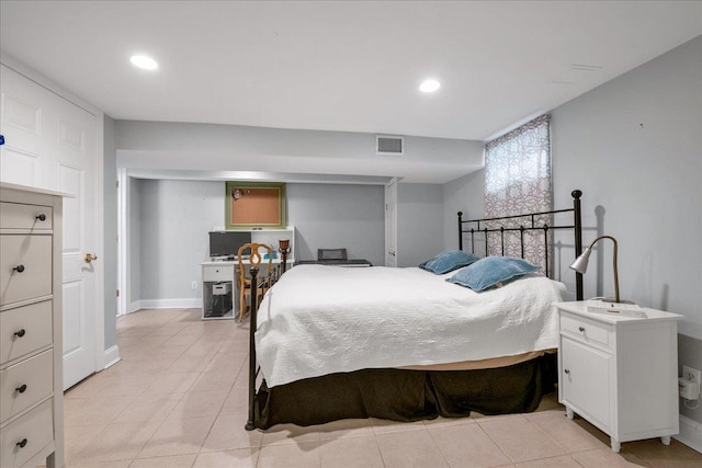 bedroom with recessed lighting, light tile patterned floors, visible vents, and baseboards