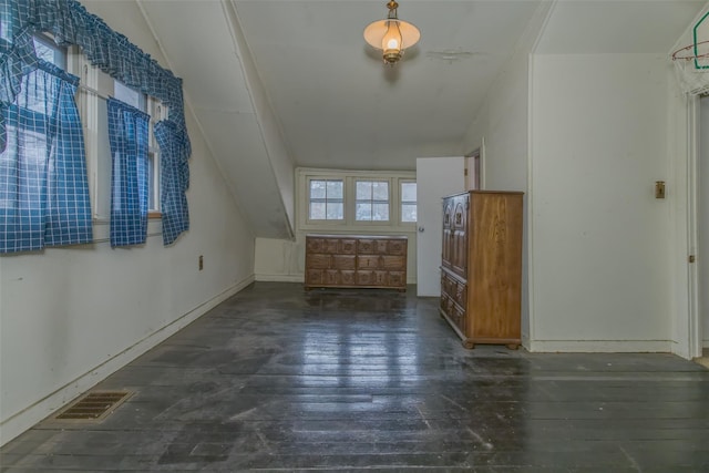 bonus room featuring visible vents and hardwood / wood-style floors