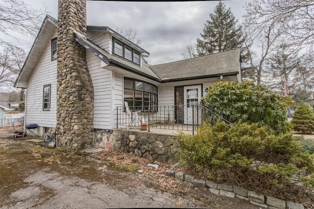 view of front of home with a chimney