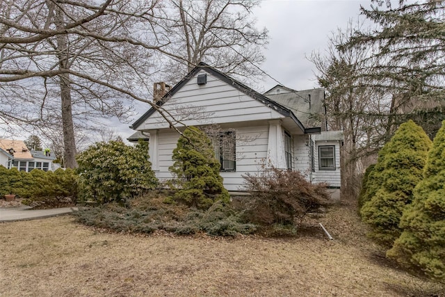 view of front of house with a chimney