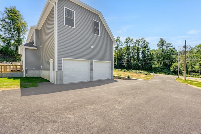 view of home's exterior featuring a garage