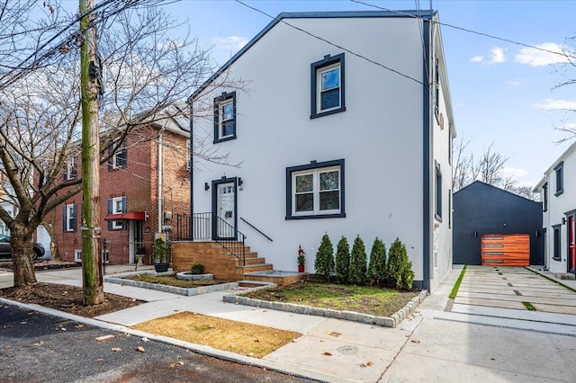 townhome / multi-family property featuring stucco siding