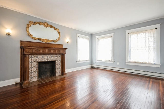 unfurnished living room featuring baseboards, a fireplace, dark wood-style flooring, and a baseboard radiator