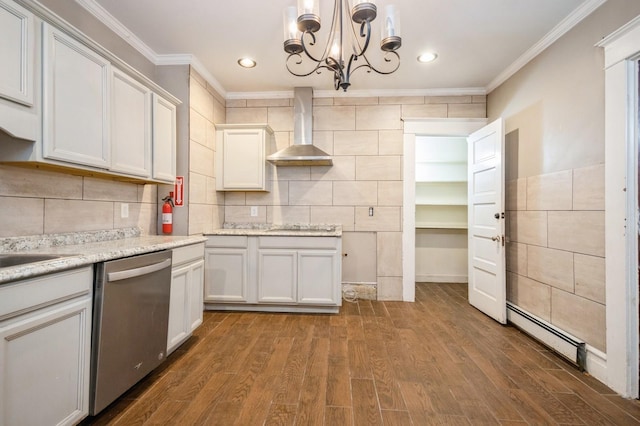 kitchen with dark wood-style floors, wall chimney exhaust hood, crown molding, baseboard heating, and dishwasher