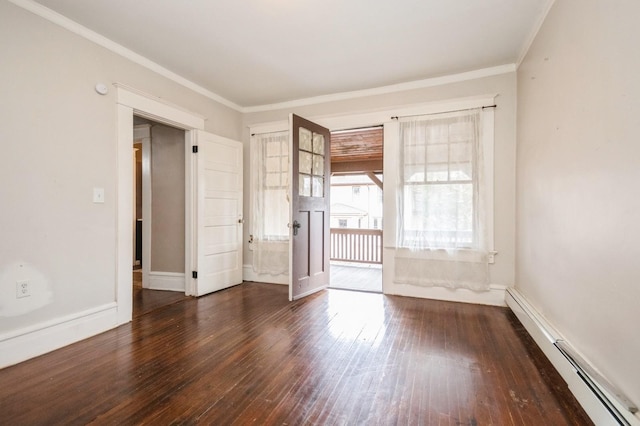 unfurnished room with a baseboard radiator, baseboards, crown molding, and hardwood / wood-style flooring