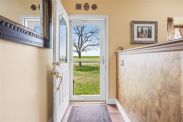 2100 Duck Pond Rd, Cutchogue, NY 11935 - doorway with wood finished floors and baseboards