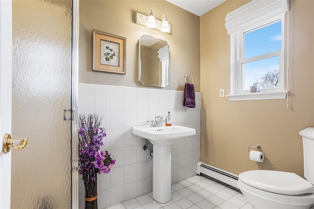 2100 Duck Pond Rd, Cutchogue, NY 11935 - full bath with baseboard heating, toilet, tile patterned floors, tile walls, and a shower stall