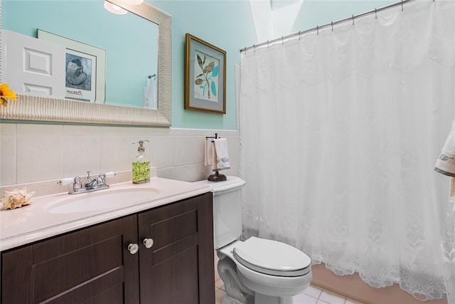 2100 Duck Pond Rd, Cutchogue, NY 11935 - full bath with toilet, tile patterned floors, vanity, shower / bath combination with curtain, and wainscoting