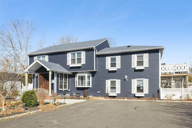 view of front of home with roof with shingles