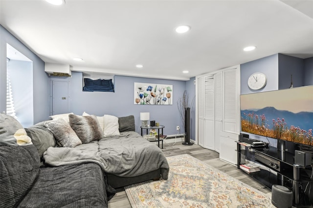 living area featuring recessed lighting and wood finished floors