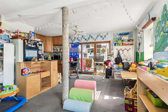 interior space featuring ceiling fan