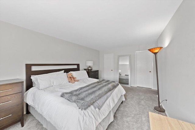 bedroom featuring light colored carpet