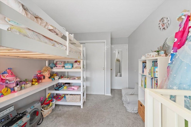 carpeted bedroom with a closet