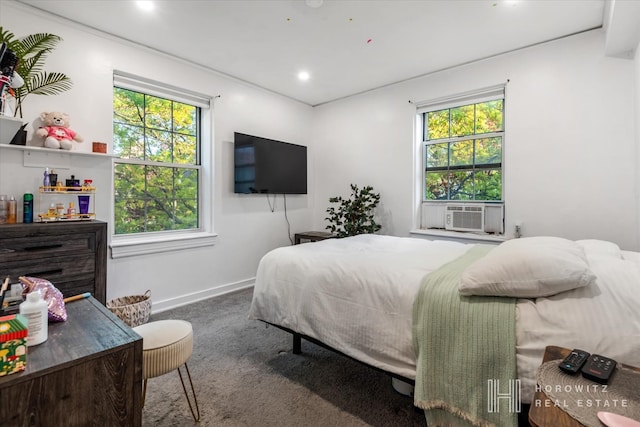 bedroom featuring recessed lighting, cooling unit, baseboards, and carpet floors