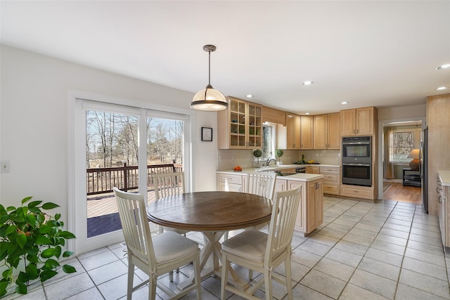 dining room featuring light tile patterned flooring and recessed lighting