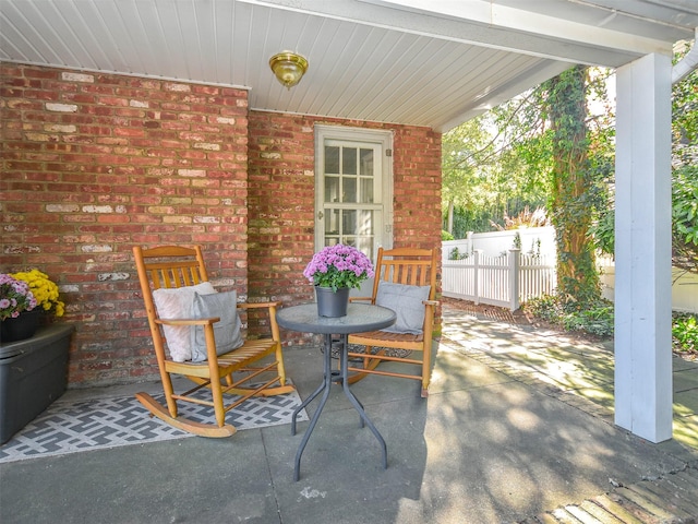 view of patio / terrace with fence