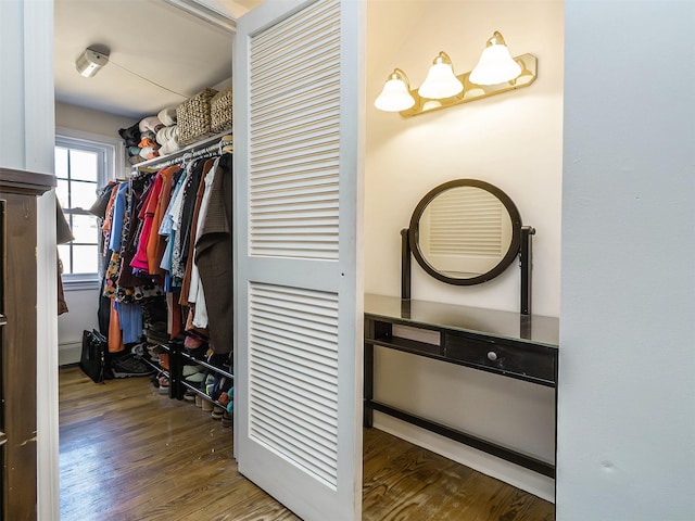 spacious closet featuring wood finished floors