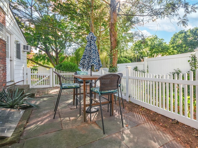 view of patio / terrace featuring outdoor dining space and a fenced backyard