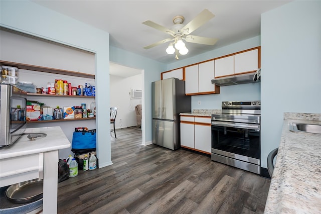 kitchen featuring under cabinet range hood, stainless steel appliances, light countertops, and white cabinetry