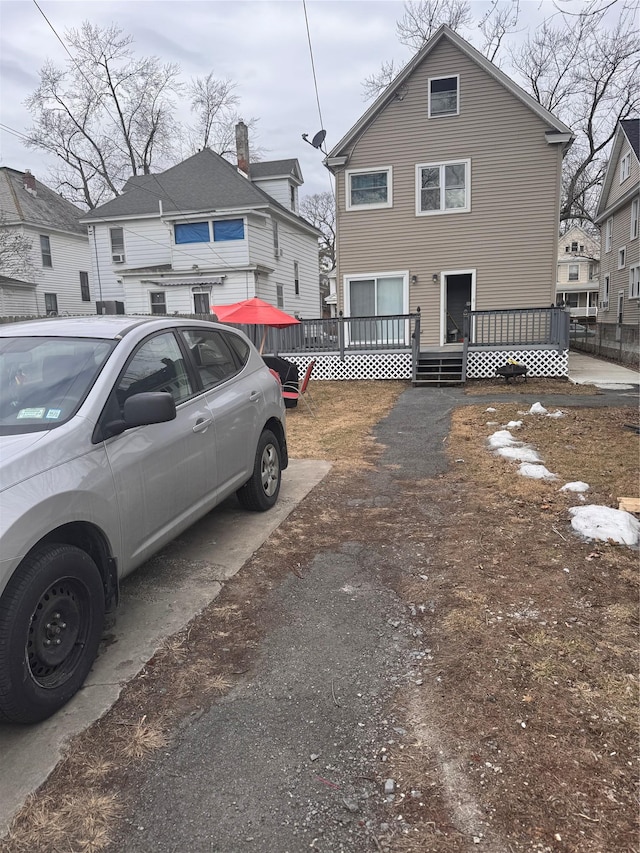 view of front of home with a wooden deck