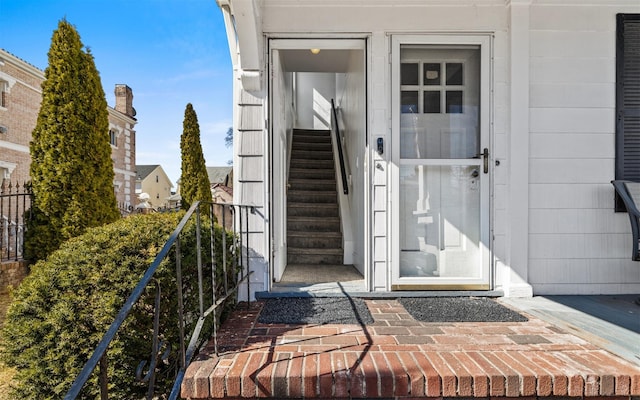 entrance to property featuring a balcony