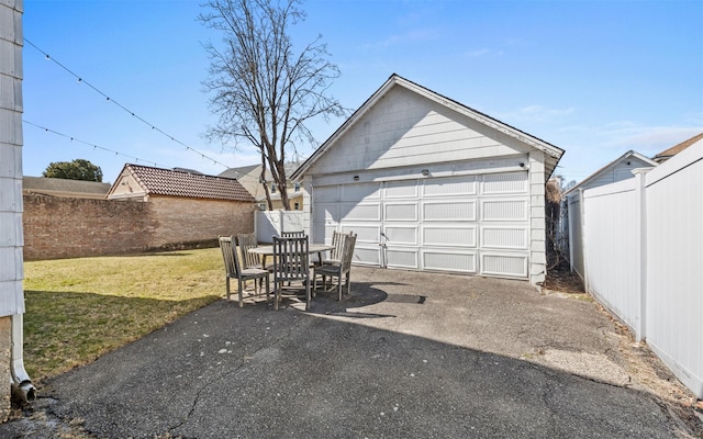 detached garage with fence