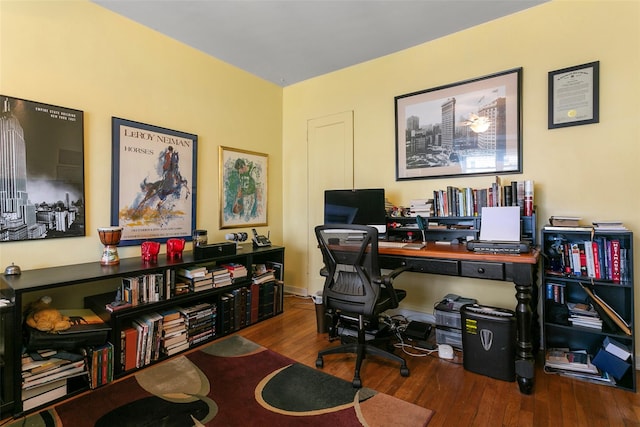 home office with wood finished floors