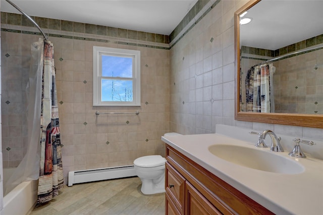 full bathroom with toilet, a baseboard heating unit, wood finished floors, tile walls, and vanity