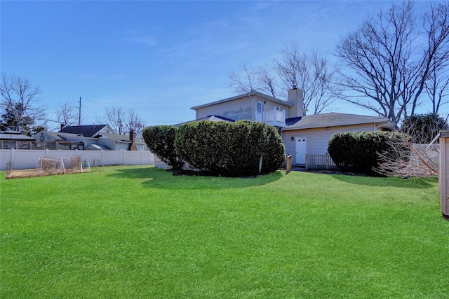 view of yard featuring fence